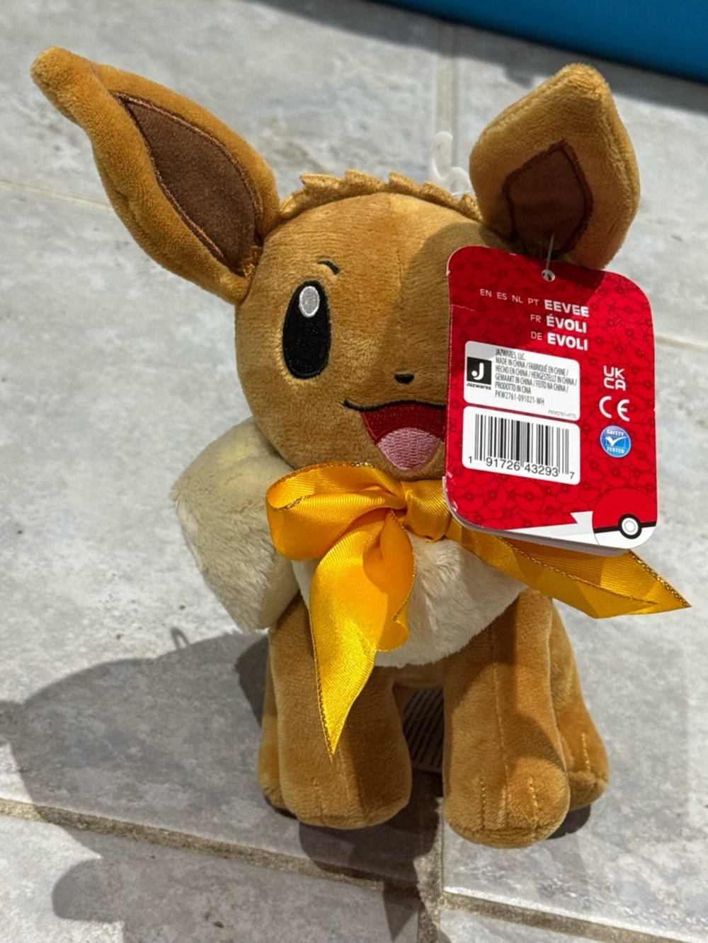 Pokemon Holiday Eevee Plush in Brown with Yellow Bow